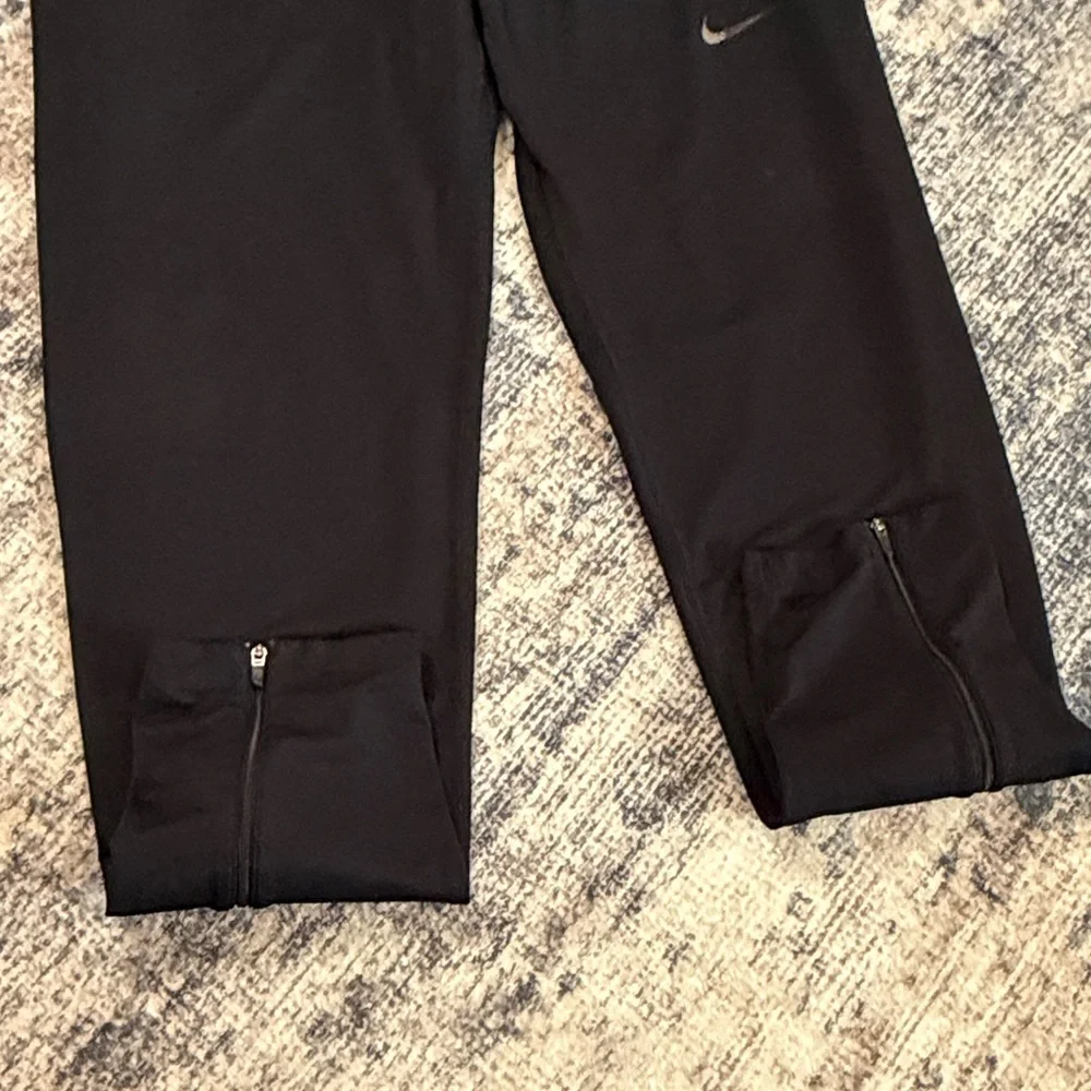 Nike Men's Black Joggers with Silver Logo